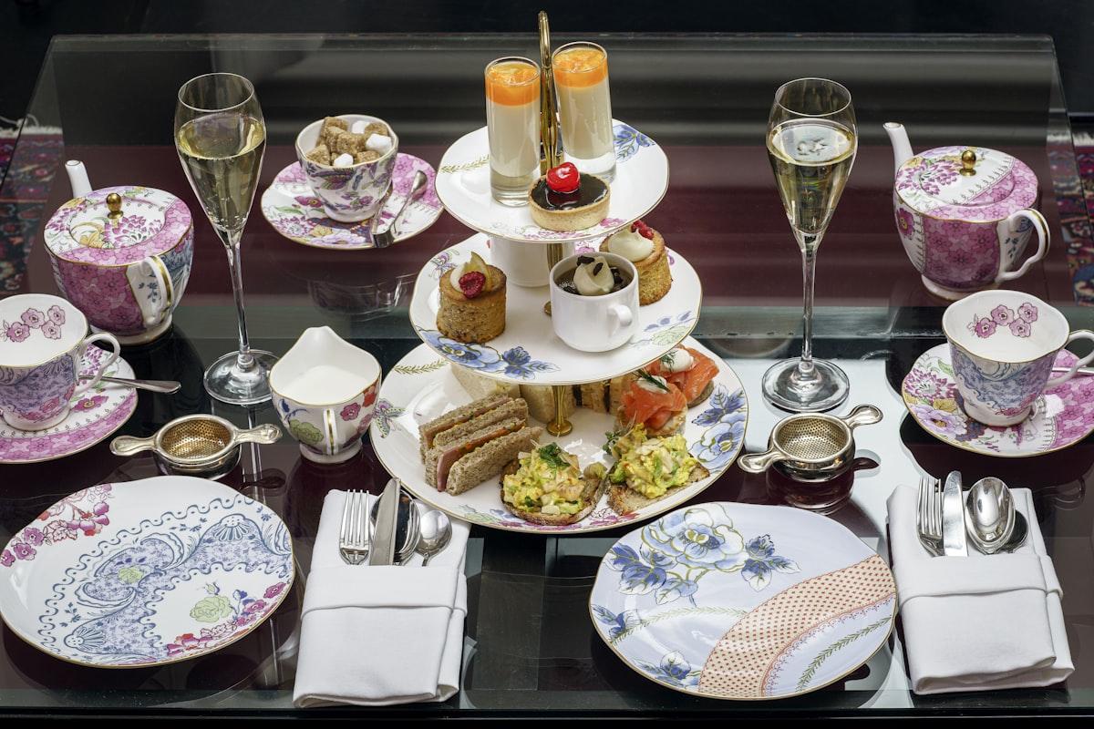 A traditional afternoon tea spread with scones, sandwiches and fine china